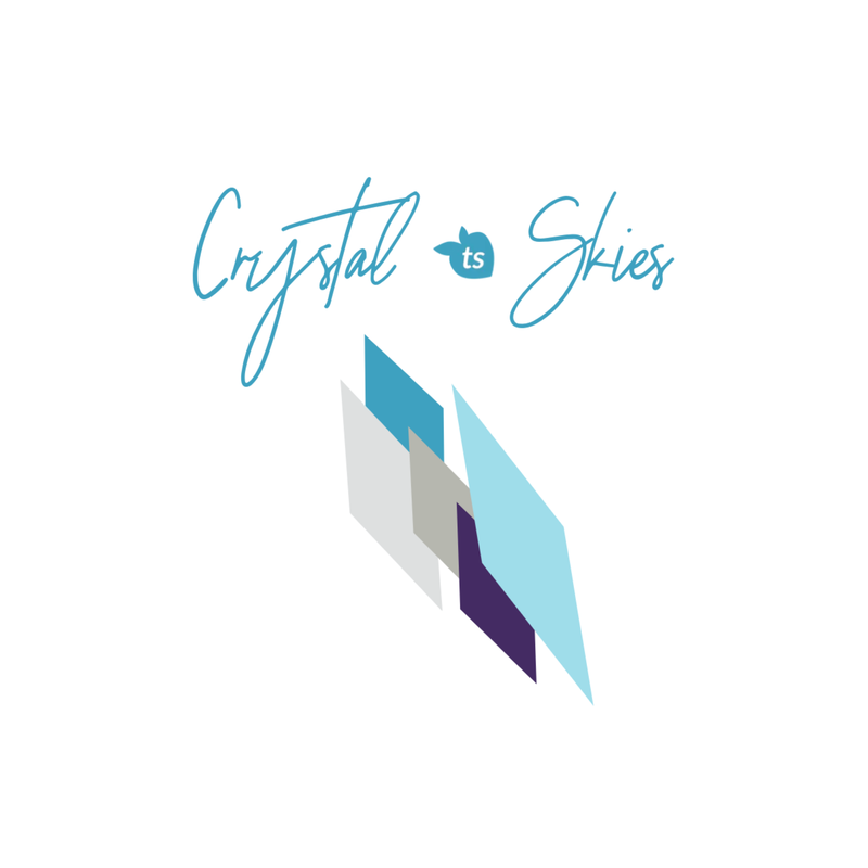 Elegant Crystal Skies logo with layered geometric sky-toned shapes.